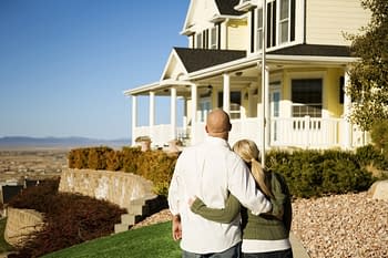 Homeowners insurance - couple looking at their new home