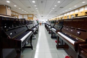 Pianos Lined up in a Piano Store